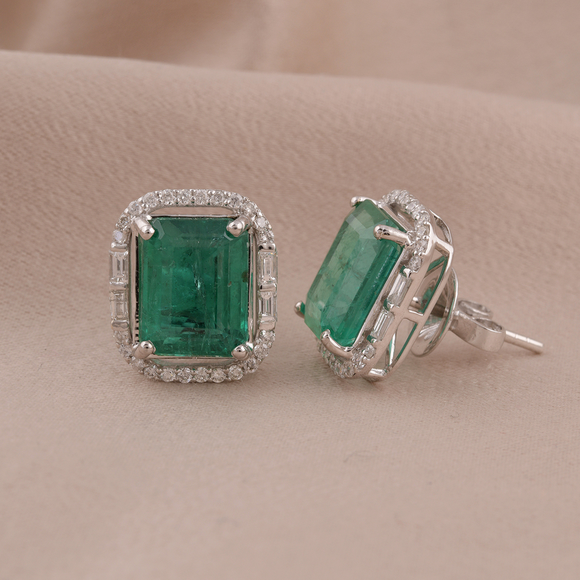 7.25 Ct. Tcw SI/H Diamond & Zambian Emerald Halo Stud Earrings in Solid Gold