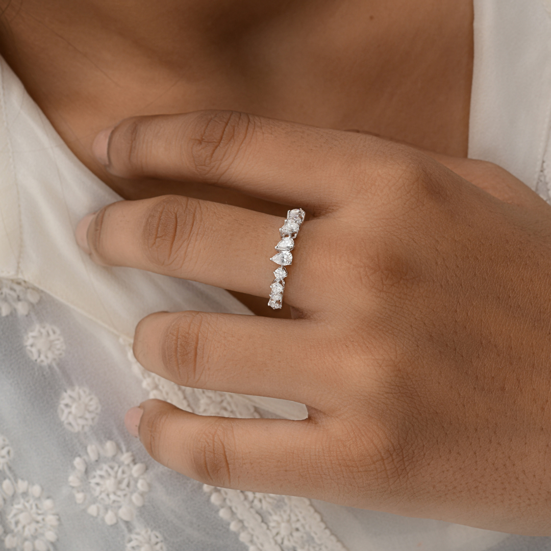 Delicate Pear Shaped Diamond Eternity Band Ring in Fine Gold