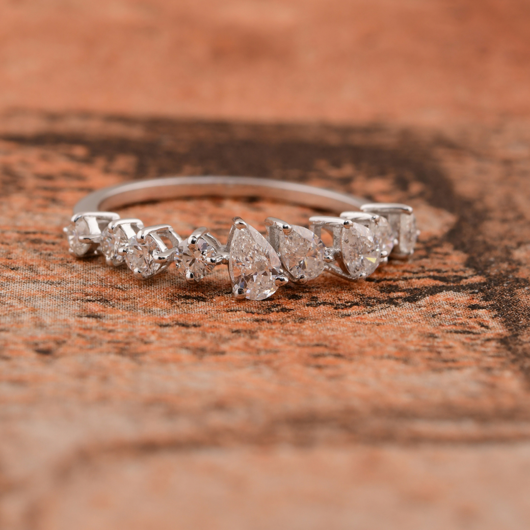 Delicate Pear Shaped Diamond Eternity Band Ring in Fine Gold