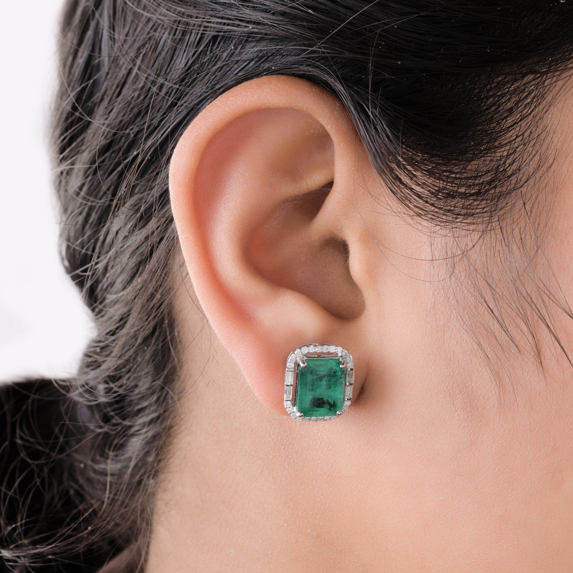 7.25 Ct. Tcw SI/H Diamond & Zambian Emerald Halo Stud Earrings in Solid Gold