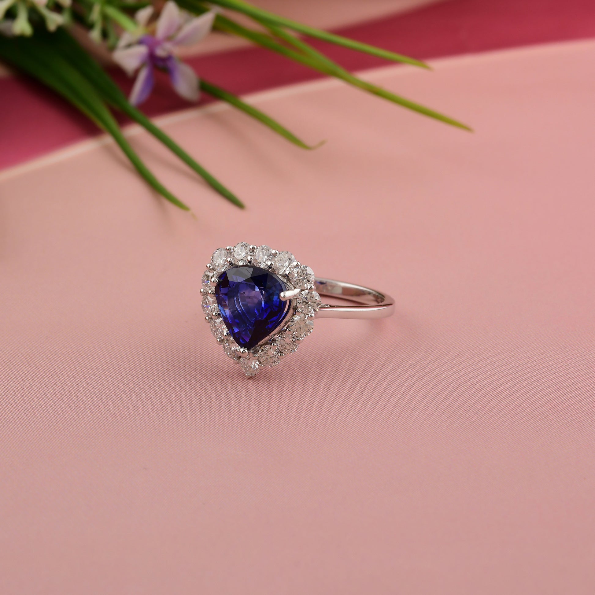 4 Tcw Trillion Cut Blue Sapphire Halo Ring with Round Diamonds