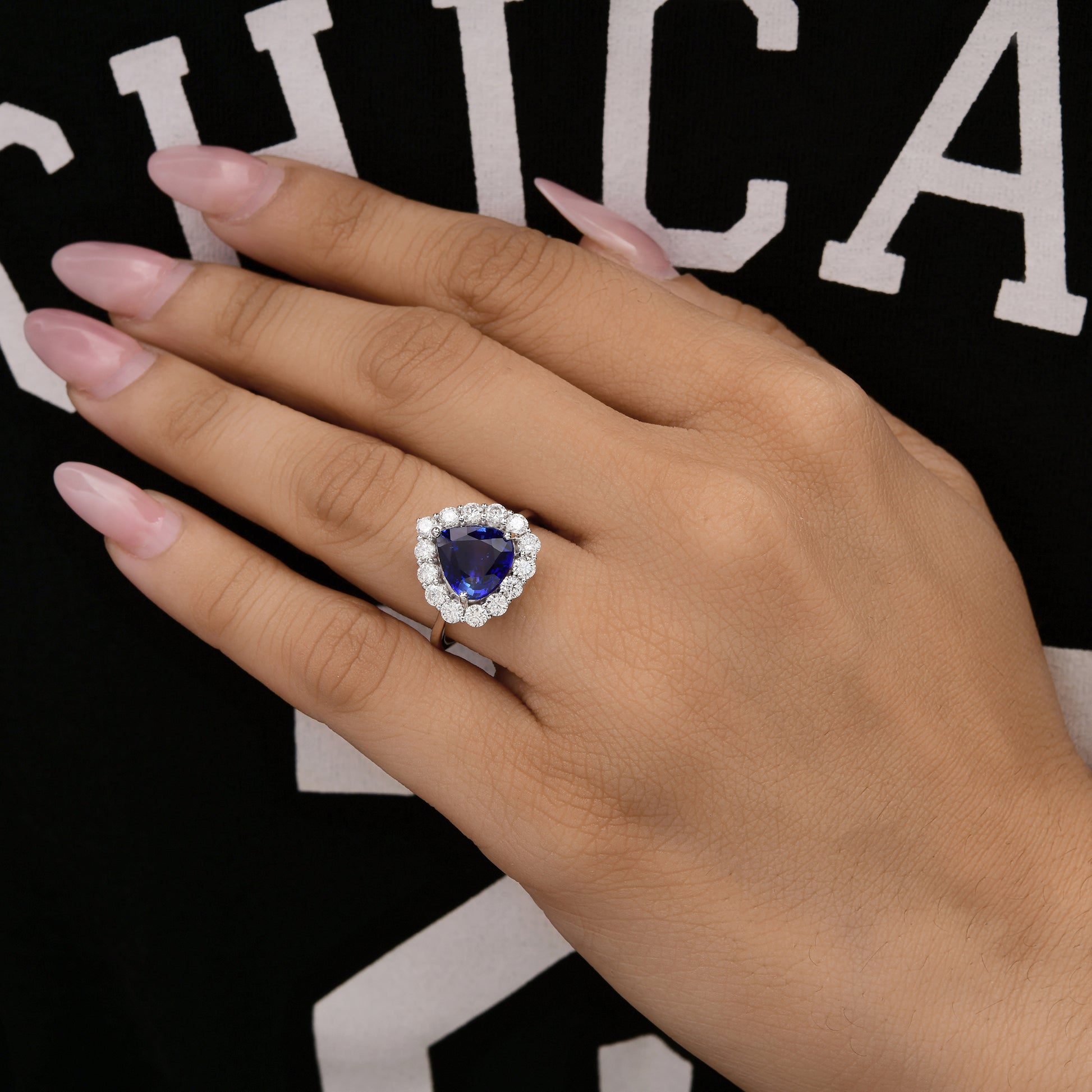 4 Tcw Trillion Cut Blue Sapphire Halo Ring with Round Diamonds
