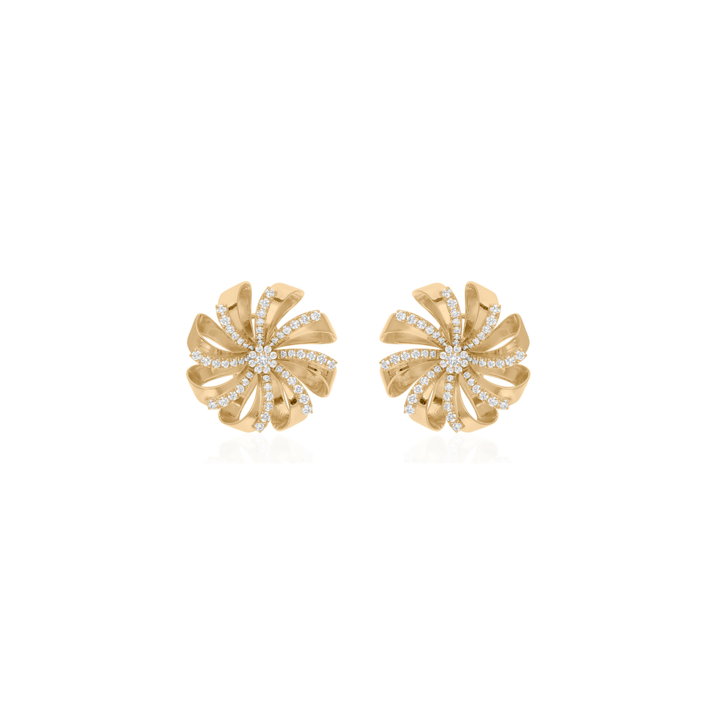 Gold earrings with diamond accents on a white background