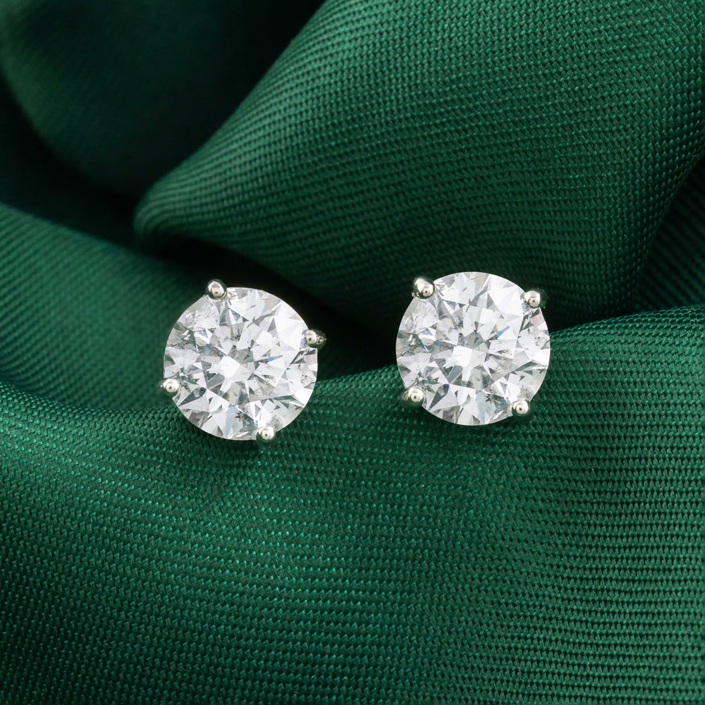 Round Brilliant 4.02ct Solitaire Diamond Stud Earrings featuring a brilliant-cut natural diamond in a classic solitaire design