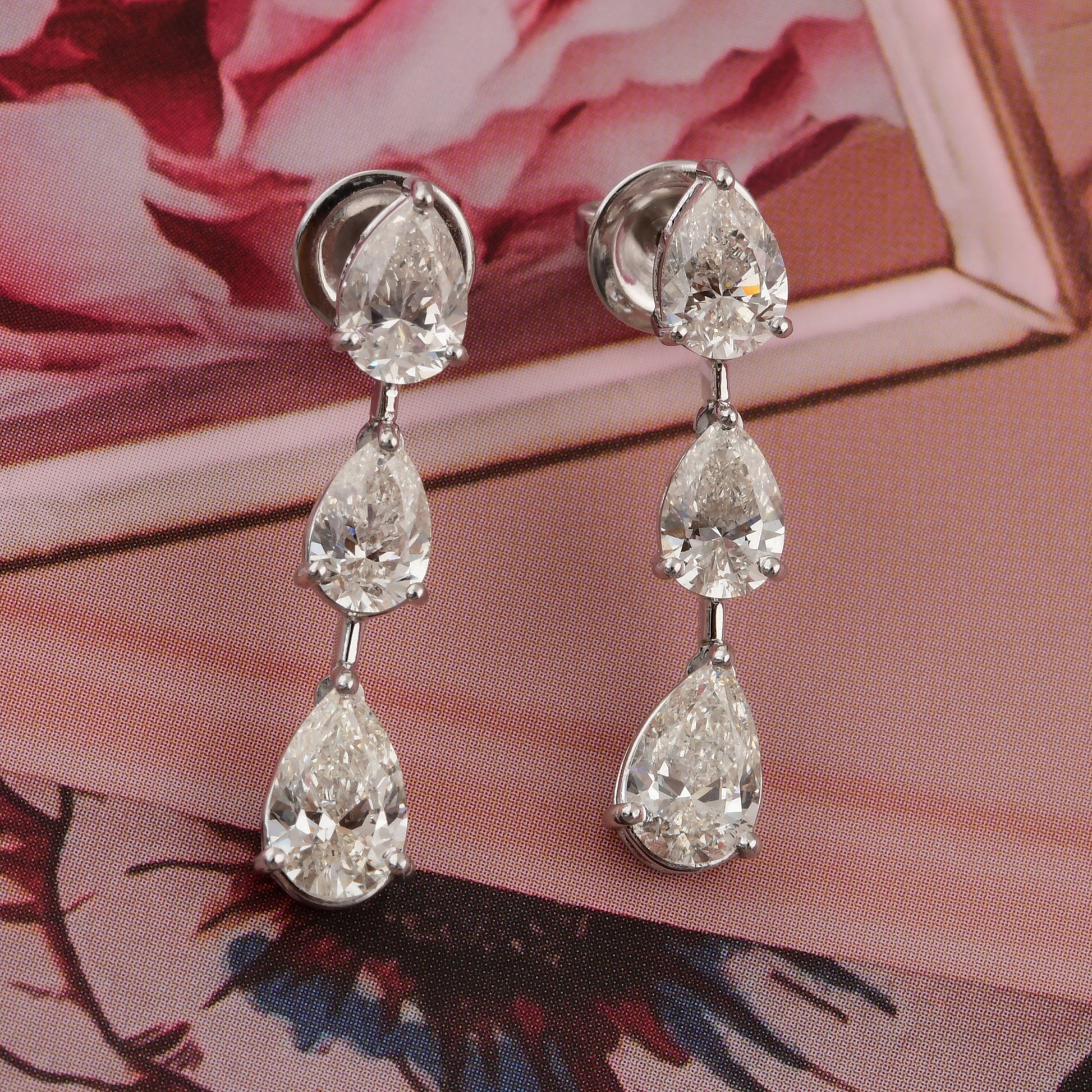 Three Pear Cut 4.06 Carat Natural Diamond Teardrop Earrings
