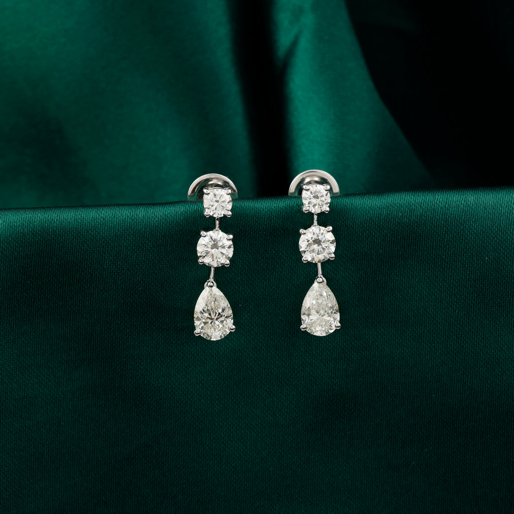 Three Stone Round Pear Cut Diamond Drop Earrings in Fine Gold