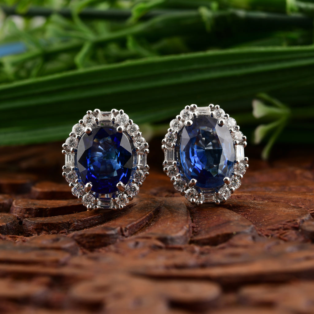 Fine Gold Oval Cut Blue Sapphire and Diamond Halo Stud Earrings
