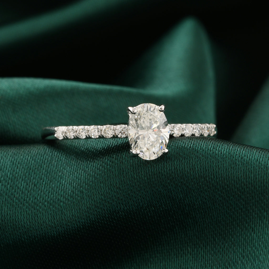 Timeless Oval Diamond Solitaire Engagement Ring in Fine Gold