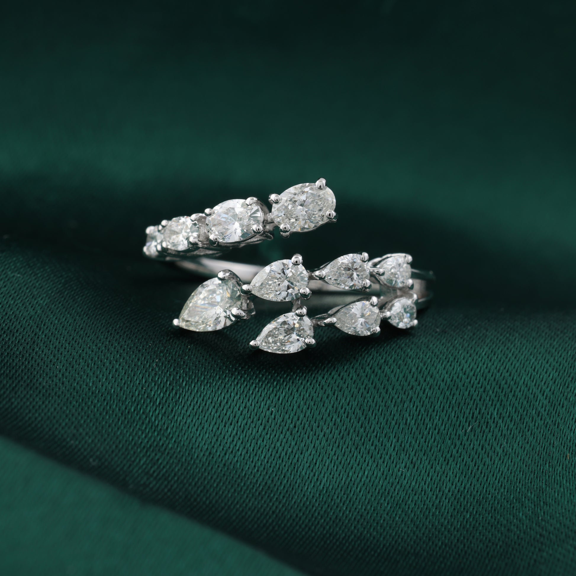 Pear Oval Cut Diamond Open Bypass Ring in Fine Gold
