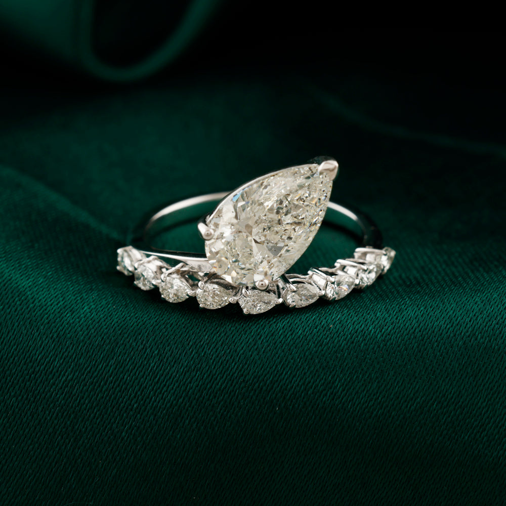 Pear Cut Natural Diamond Engagement Ring in Fine Gold pear shaped natural diamond engagement ring in fine gold