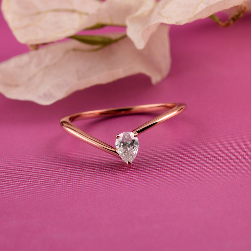 Minimal Pear Cut Natural Diamond Solitaire Ring in Fine Gold