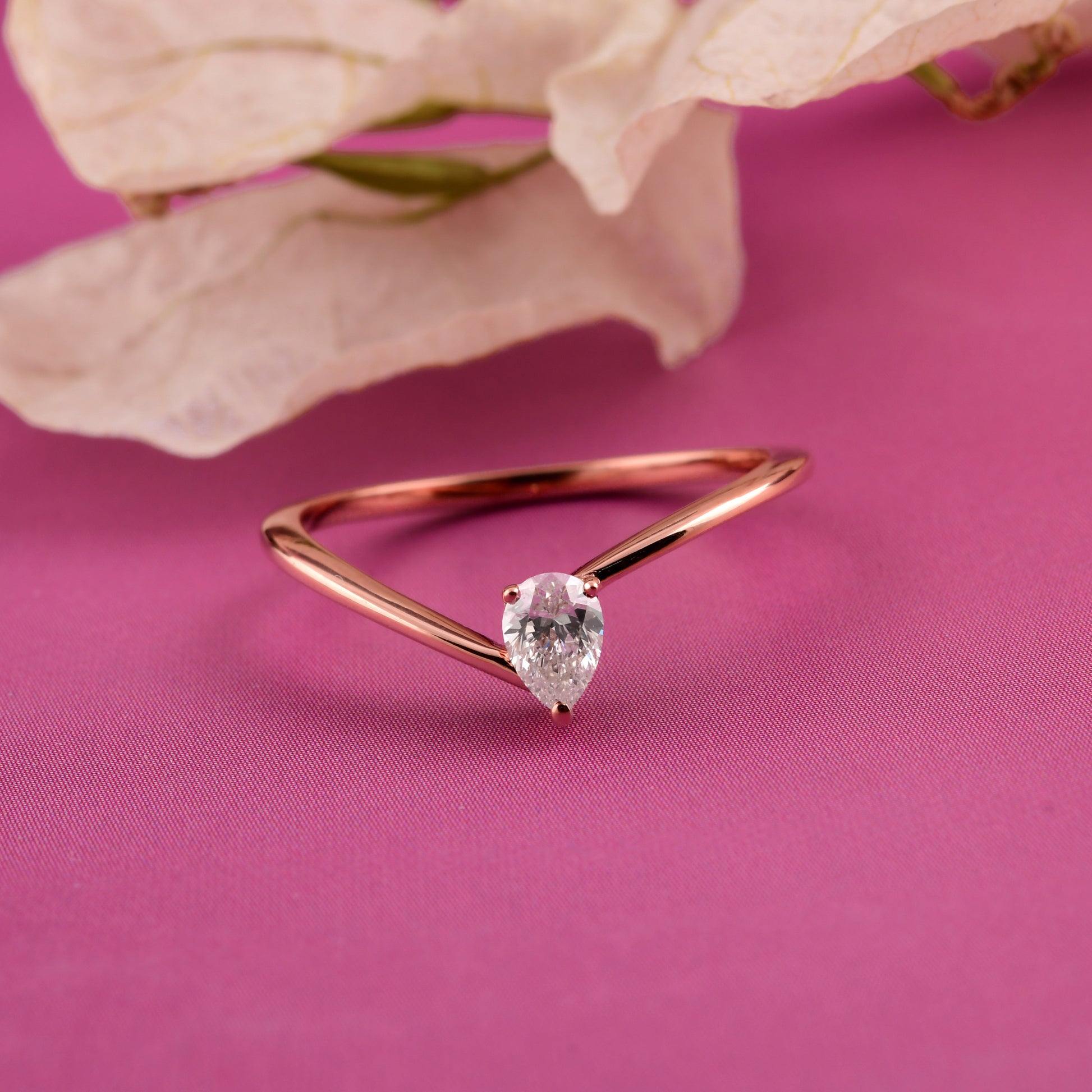 Minimal Pear Cut Natural Diamond Solitaire Ring in Fine Gold