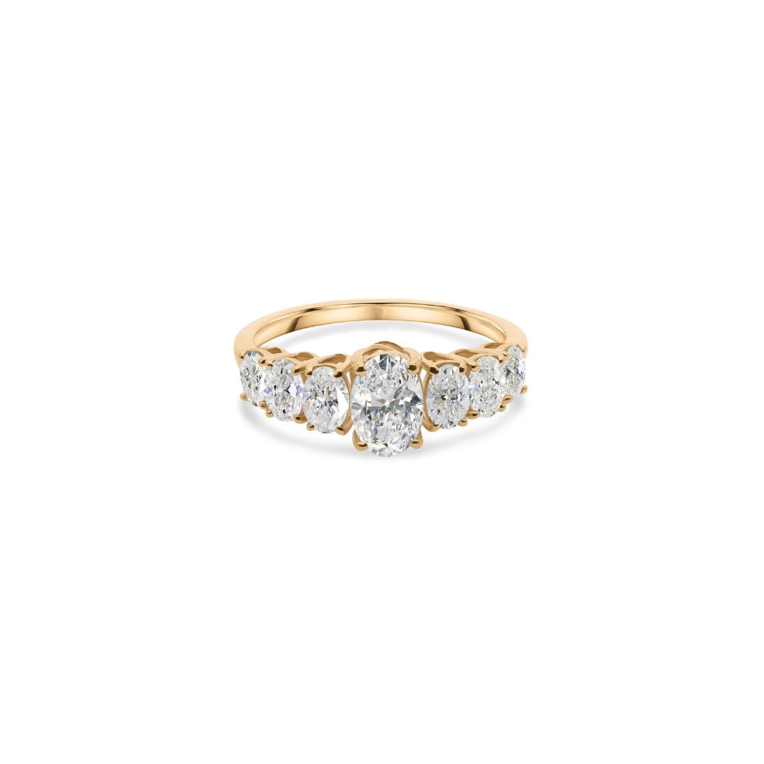 Timeless Oval Natural Diamond Ring in Gold with Graduated Side Stones