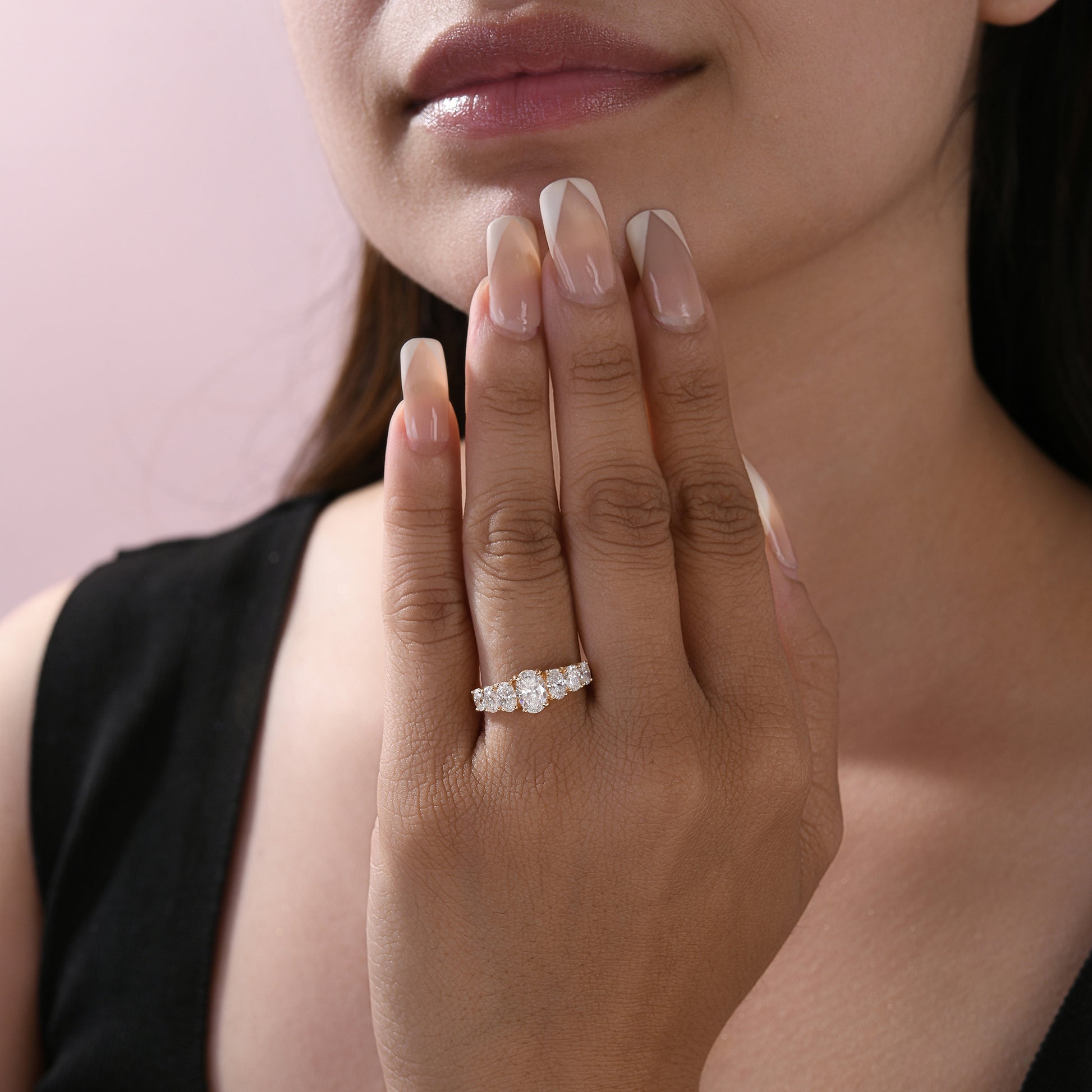 Timeless Oval Natural Diamond Ring in Gold with Graduated Side Stones