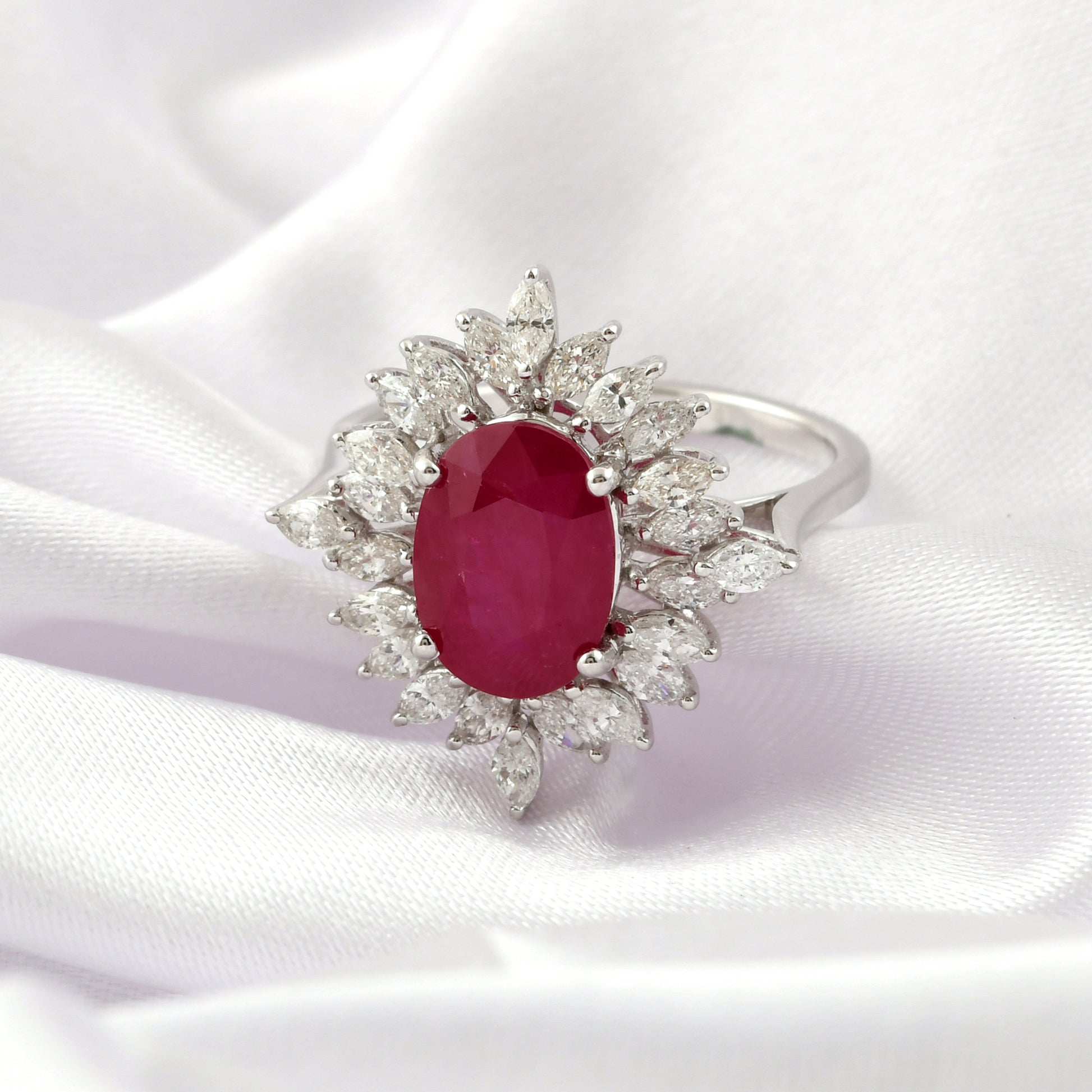 Vintage Inspired Oval Cut Ruby Ring Surrounded by Marquise Diamonds